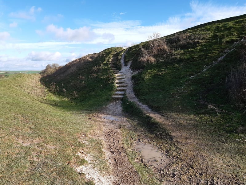 Once through the gate, head up the concrete steps ahead to the left.