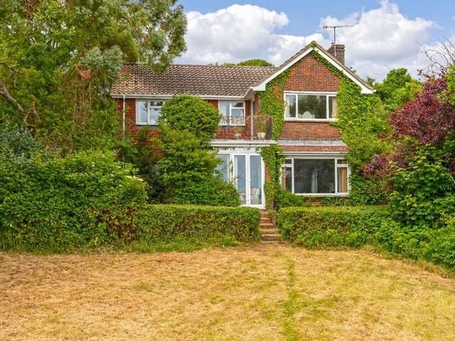 This substantial detached family house sits on the highest point in North Lancing, with grounds totalling 0.5 acres of land. Offers in the region of £1million are invited for this four-bedroom property at the foot of the South Downs National Park, with magnificent panoramic coastal views.