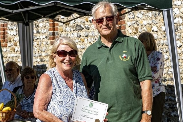 June Savory receives a Floral Art Certificate from Colin Crane at East Preston and Kingston Horticultural Society flower show