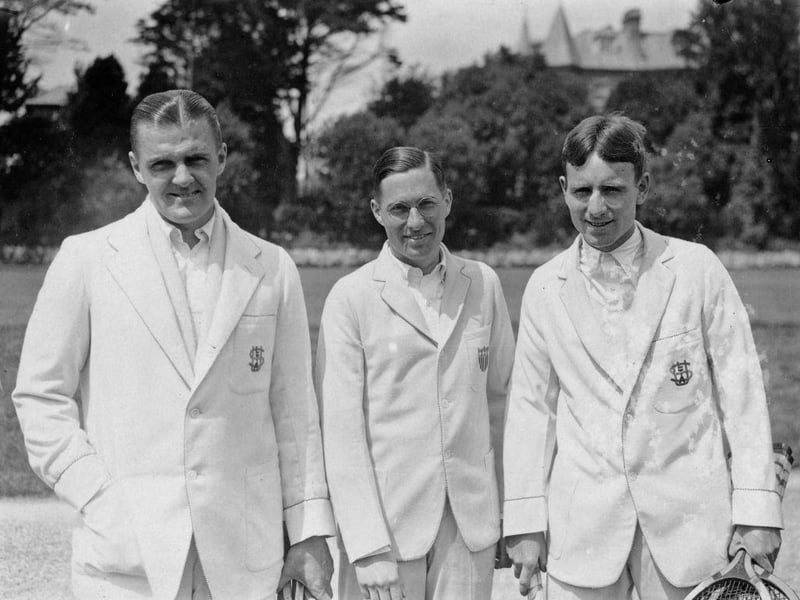 American tennis team captain C S Garland between England's doubles partners R Casey (left) and J Hennessey at the International Tennis Tournament at Eastbourne on 17th June 1925.