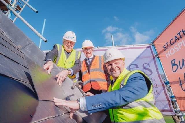Andrew Wates OBE, Bill Mackie and Mark Hart at the topping out event  