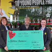 Members of Waitrose staff presented Deputy Headteacher, Ms Zoe James, with the cheque.