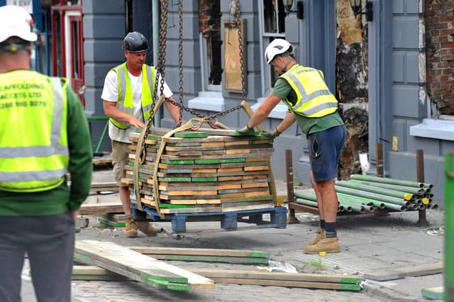 Scaffolding work has started on the Angel Inn in Midhurst. Pic S Robards SR2305311