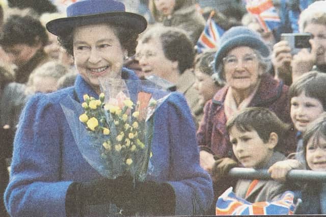 The Queen was gifted bouquets of flowers by excited residents.