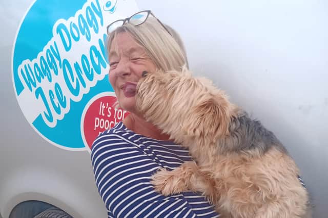 Doggy ice cream-maker Petra Bayliss gets a friendly lick of thanks