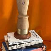 The hand-carved pen nib trophy