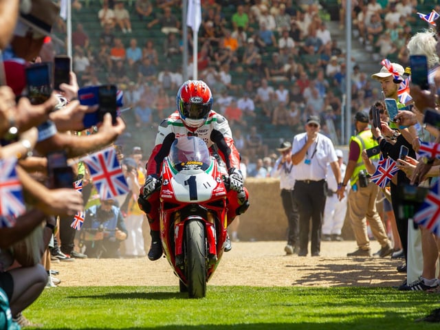 Speeding through the crowd. Photo: Michael John Reed.