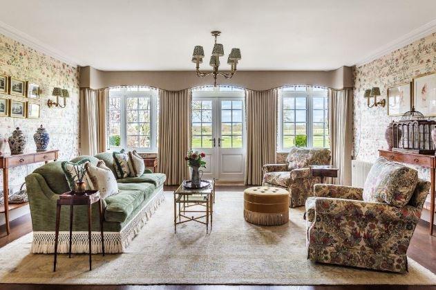 There is a light and airy sitting room, family room and a snug