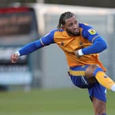 MANSFIELD, ENGLAND - DECEMBER 26: Kellan Gordon of Mansfield Town in action during the Sky Bet League Two between Mansfield Town and Northampton Town at One Call Stadium on December 26, 2022 in Mansfield, England. (Photo by Pete Norton/Getty Images)