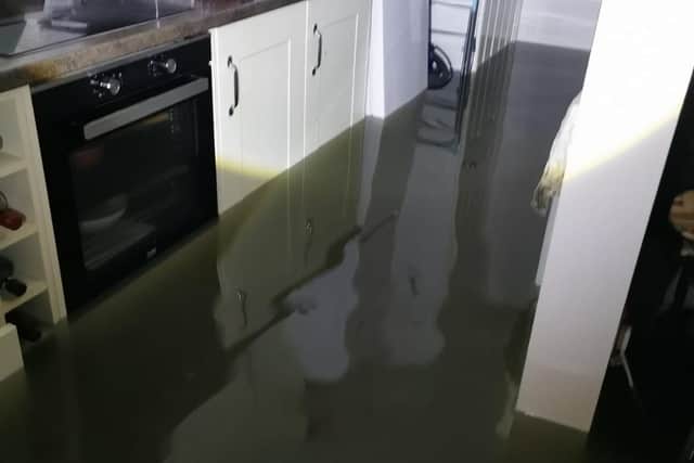 Residents were evacuated in Littlehampton during the night after their homes were flooded. Up to nine properties were reportedly affected. Photo: Robbie Davison