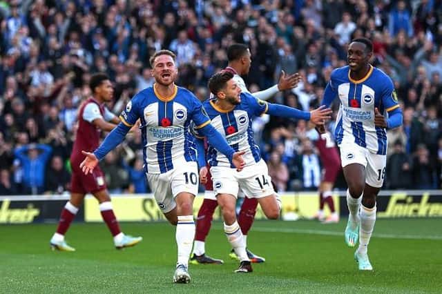 Alexis Mac Allister of Brighton & Hove Albion celebrates after scoring Albion's first goal during the Premier League match against Aston Villa - their last fixture before the World Cup break