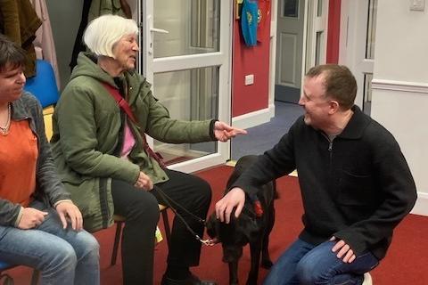 Comedians Chris McCausland and Jon Long with Sight Support Worthing volunteers and members at the charity's centre in Rowlands Road