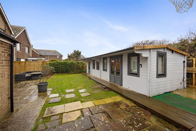 This detached family home on Goring seafront has a one-bedroom annexe and separate studio / workshop in the garden. It is on the market with Robert Luff & Co, priced at £895,000.