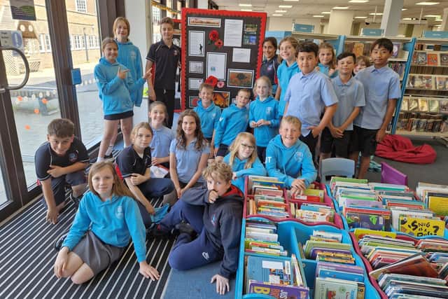 Homefield Primary School pupils with some of their work on show at Worthing Library