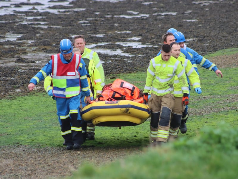 The emergency services came out in force to rescue a family who became stuck in the mud in West Wittering over the weekend.