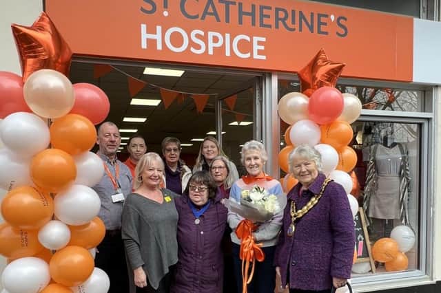 Kate Rowbottom Chairman of Horsham District Council at the shop opening with St Catherine’s staff and volunteers 
