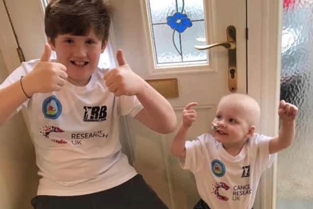Keen to support his little sister, Harry set himself the challenge to run two miles a day last March, along with step-dad Simon, and raised an astonishing £15,421 for Cancer Research UK.