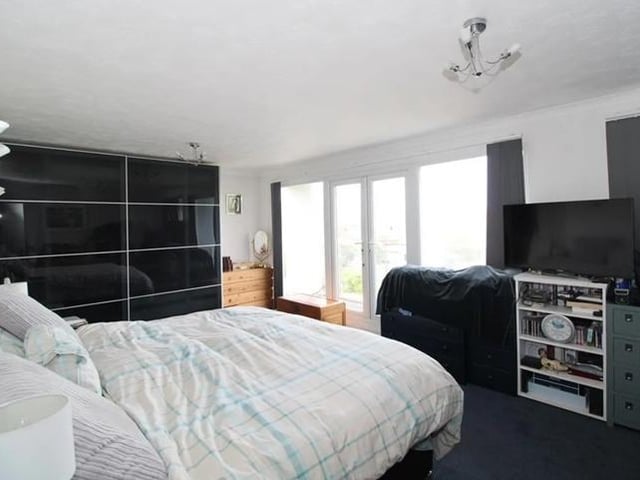 On the first floor are three bedrooms, family bathroom, en-suite shower room and balcony with far reaching views to Seaford Head, town centre and Sea.