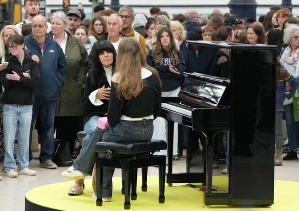 Claudia Winkleman has been pictured at Brighton railway station as her search continues to find more of the UK's most exciting amateur pianists.