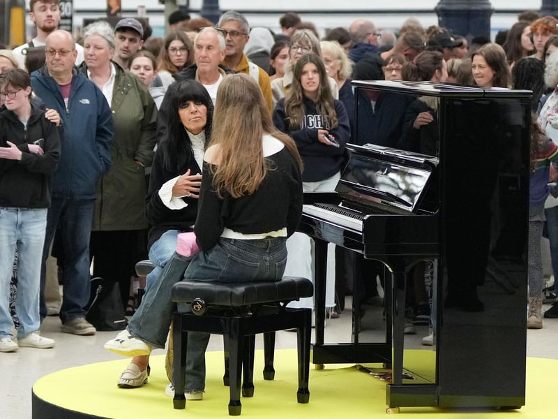 Claudia Winkleman has been pictured at Brighton railway station as her search continues to find more of the UK's most exciting amateur pianists.