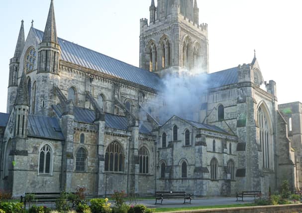 15 photos: smoke rising from West Sussex Cathedral and fire engines, ambulances and police on scene