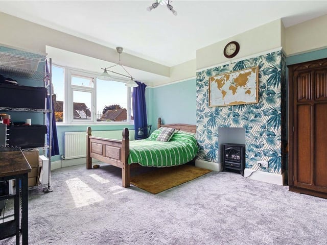 Another fireplace gives this bedroom an extra layer of character.