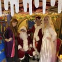 Anna, Elsa with Father Christmas and Mrs Claus