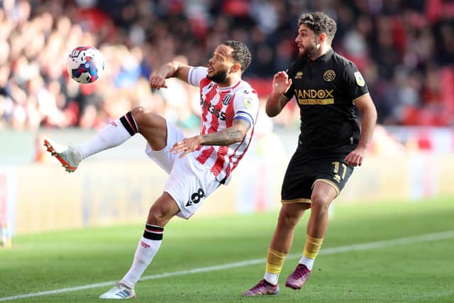 Brighton & Hove Albion's Reda Khadra (right) in action for loan club Sheffield United at Stoke City. Picture by Nathan Stirk/Getty Images