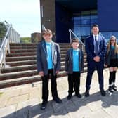 Principal Simon Addison with students.