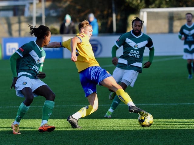 Action from Lancing's 3-2 win over Ashford United on Saturday. Picture by Stephen Goodger