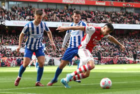 Gabriel Martinelli of Arsenal takes on Joel Veltman and Pascal Gross of Brighton during a Premier League match in April, 2022. (Photo by David Price/Arsenal FC via Getty Images)