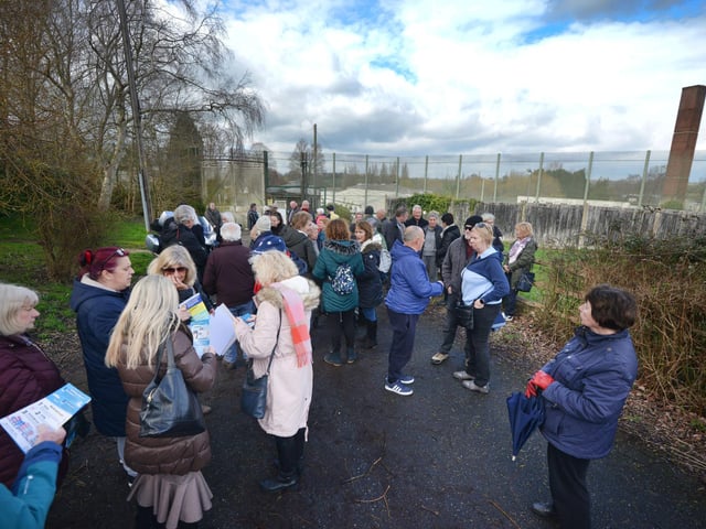 Public gathering by the gates of the Northeye site in Bexhill on Saturday April 1.