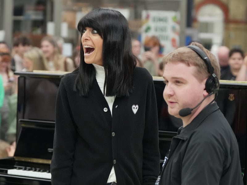 Claudia Winkleman has been pictured at Brighton railway station as her search continues to find more of the UK's most exciting amateur pianists.
