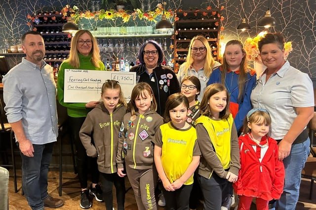 The festival was raising money for Ferring Girlguiding and a cheque for £1,750 was presented to leader Joanna Tuck at The Orange Tree in Ferring