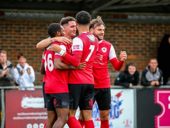 The one bright spot against Braintree - Eastbourne Borough players celebrate Greg Luer's strike | Picture: Lydia Redman