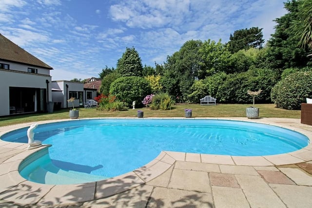 The property is on the market with Coastguards for a guide price £1,750,000. 
The house has a fully enclosed established rear garden, with a heated swimming pool.