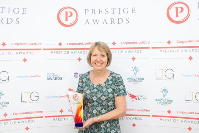 Pumpkin Patch owner Julie Ellis receiving the award for 'Fabric Shop of The Year'