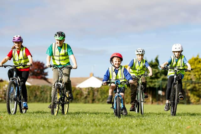 High-vis cycling jackets have been donated to Barnham Primary School