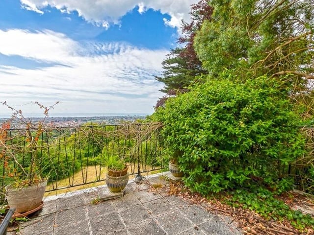 This substantial detached family house sits on the highest point in North Lancing, with grounds totalling 0.5 acres of land. Offers in the region of £1million are invited for this four-bedroom property at the foot of the South Downs National Park, with magnificent panoramic coastal views.