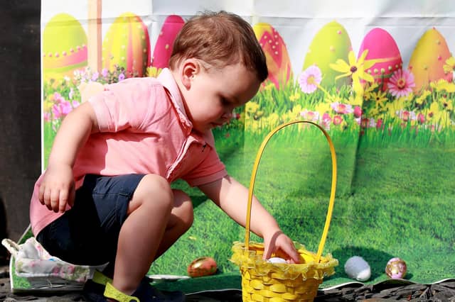 Donovan Ingham taking part in an Easter egg hunt