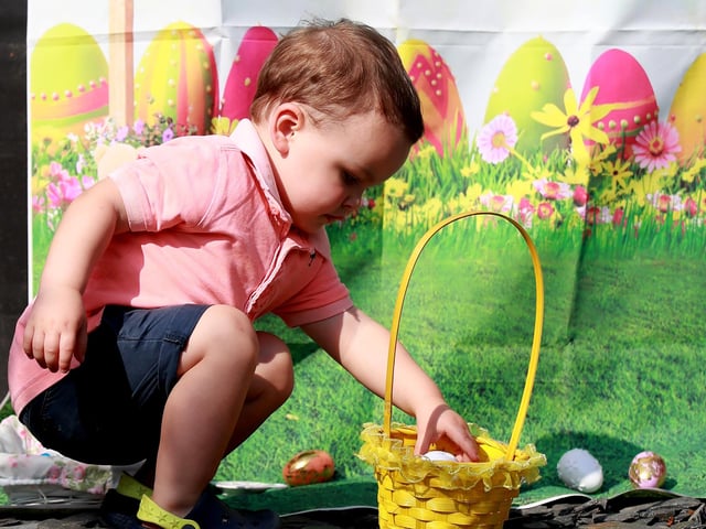 Donovan Ingham taking part in an Easter egg hunt