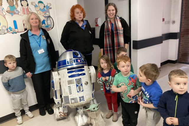 R2D2 visited kids at the Wendy House nursery at the Princess Royal Hospital in Haywards Heath