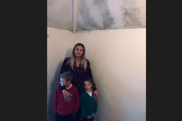 Eastbourne family says they're living with black mould - Holly Langham and her children