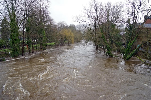 Flood waters on the River Derwent at Matlock, close to Hall Leys Park.