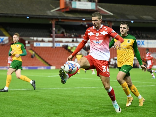 Max Watters of Barnsley in action during the Emirates FA Cup First Round match between Barnsley and Horsham at Oakwell Stadium.