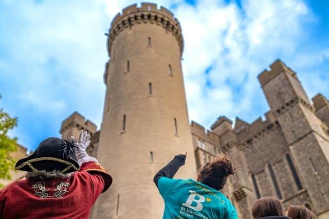 Participants will climb 200 steps up the iconic Bake House Tower’s winding staircase, then soak up the breathtaking panoramic views of Arundel and the South Downs before the abseil down the 180ft tower. Photo: Andrew Whitman