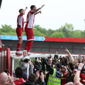 Crawley Town secured League Two survival on the final day of the season after a 0-0 draw with Salford City. Photographer Natalie Mayhew/Butterfly Football captured the celebrations, the action, the fans and Paul Scholes