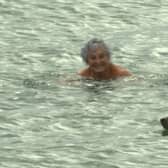 Sheer joy: Pam swims with the seal. 
Photo: Ged Burnett