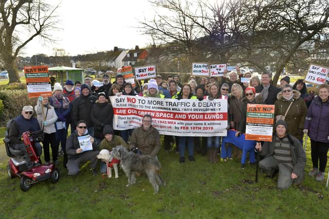 Pictured in 2019 Residents before their march to demonstrate against the proposed development of 700 homes at Morning Mills Farm in Willingdon (Photo by Jon Rigby)