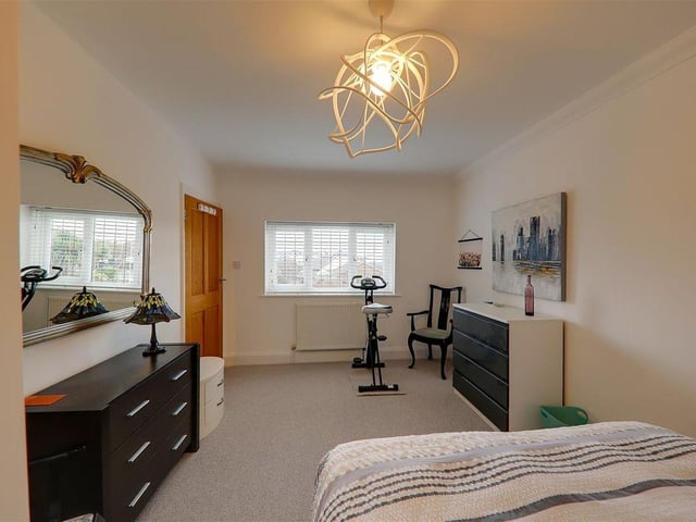 This impressive three-bedroom house close to the beach in Goring has a feature family room with part-vaulted ceiling